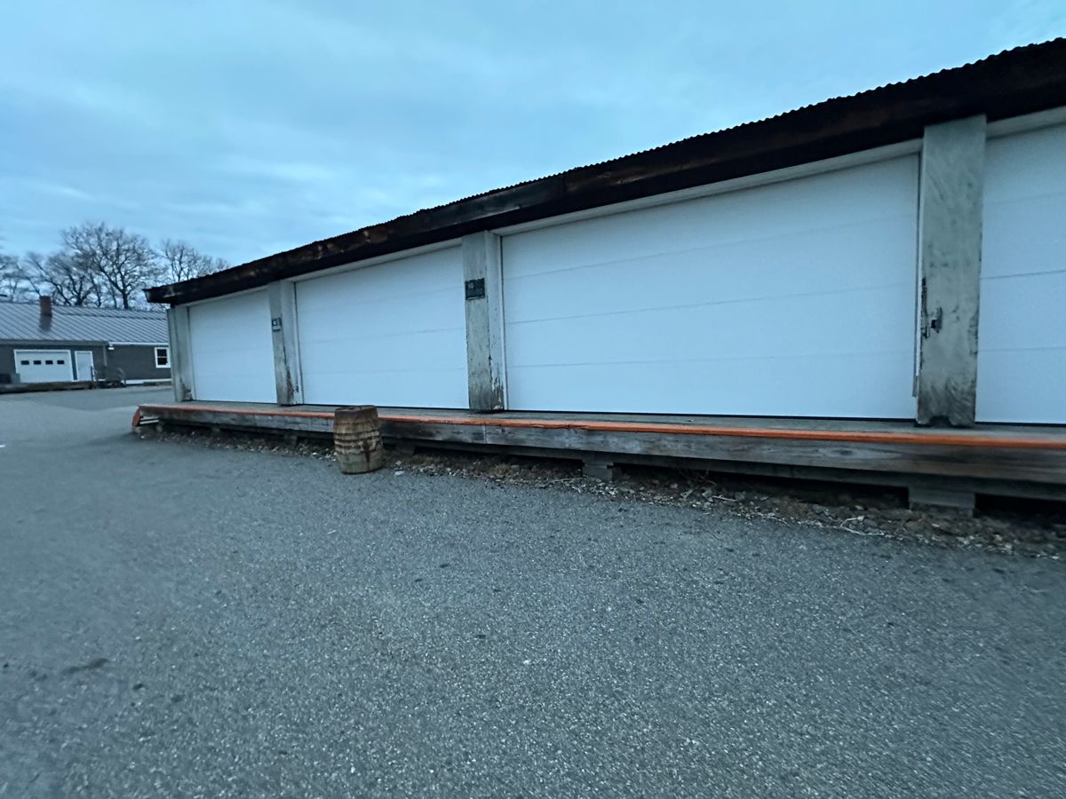Two new insulated garage doors installed in new construction home interior view